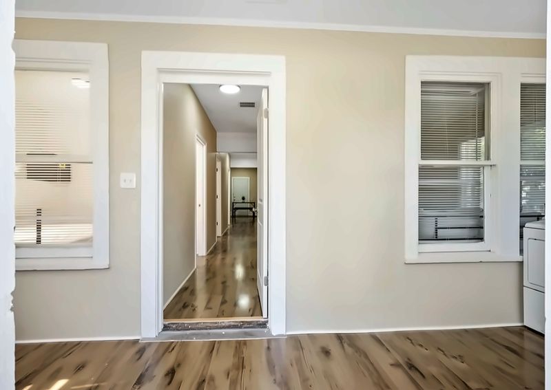 Hallway view, with the washer visible at right